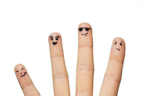 Close up of hands and fingers with smiley faces — Stock Photo, Image