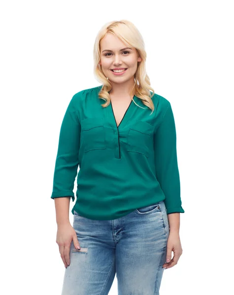 Smiling young woman in shirt and jeans — Stock Photo, Image