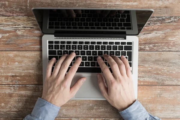 Close up of male hands with laptop typing — Stok Foto