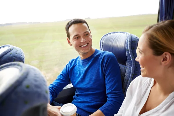 Group of happy passengers in travel bus — Stock Photo, Image