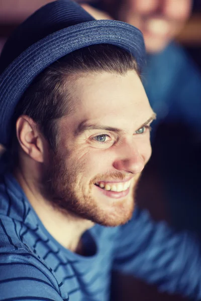 Happy young man in hipster hat — Stock Photo, Image