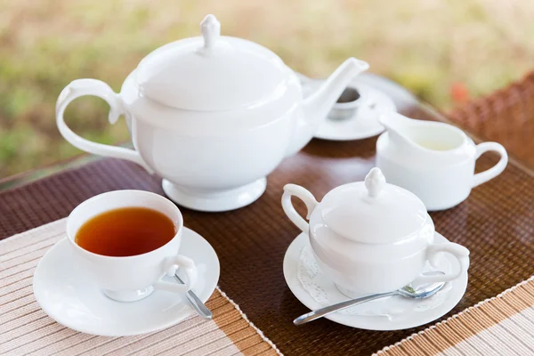 Close up of tea service at restaurant or teahouse — Stock Photo, Image