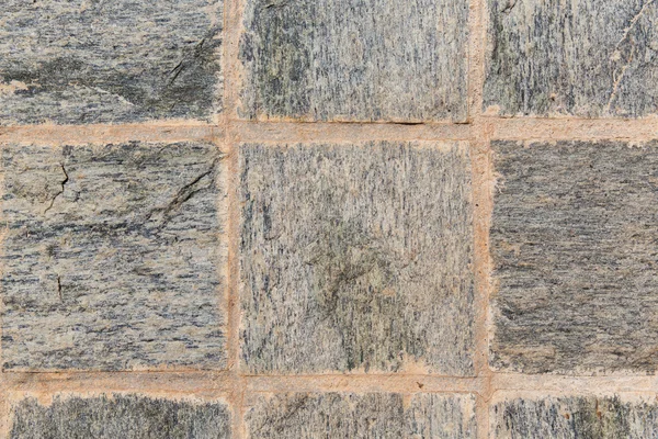 Close up of paving stone or facade tile texture — Stock Photo, Image