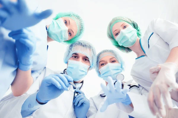 Group of doctors in operating room — Stock Photo, Image