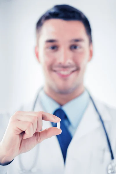 Doctor with pill in hospital — Stock Photo, Image