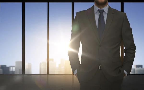 Close up of business man over office background — Stock Photo, Image