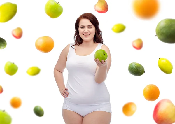 Γυναίκα ευτυχισμένη συν μέγεθος εσώρουχα με μήλο — Φωτογραφία Αρχείου