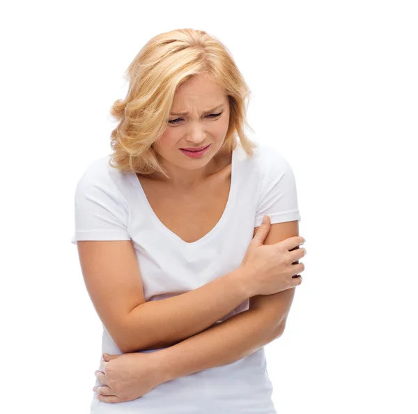 Unhappy woman suffering from pain or violence — Stock Photo, Image