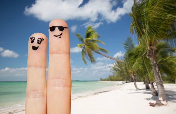 Close up of two fingers with smiley faces — Stock Photo, Image