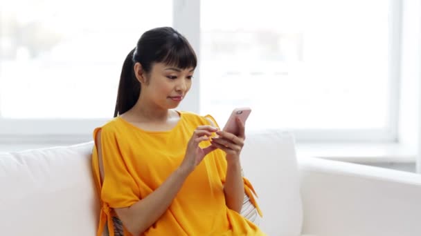 Happy asian woman taking selfie with smartphone — Stock Video