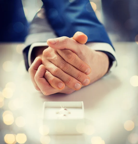 Close up of male gay couple and wedding rings — Stock Photo, Image