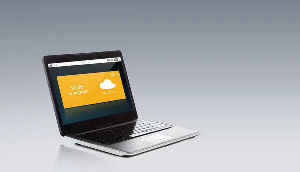 Laptop computer with weather cast on screen — Stock Photo, Image