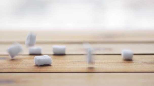 Close up of white sugar on wooden board or table — Stock Video