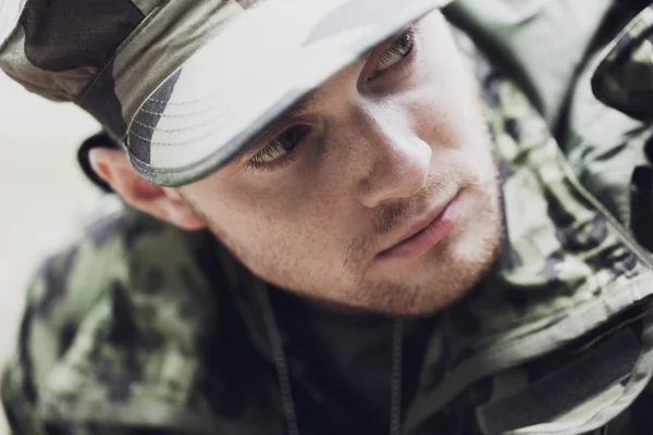 Close up of young soldier in military uniform — Stock Photo, Image