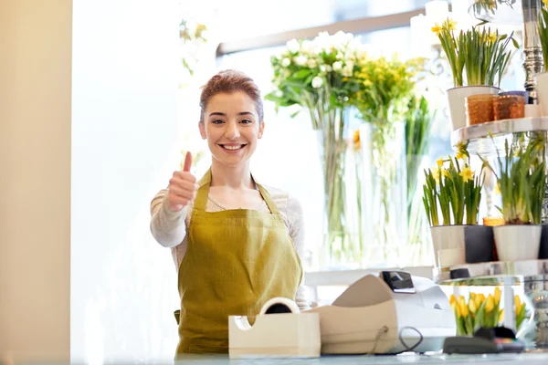 Florist woman at flower shop showing thumbs up — Stock Photo, Image