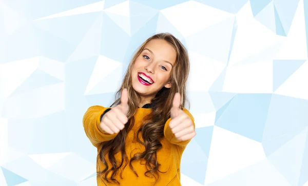 Happy young woman or teen girl showing thumbs up — Stock Photo, Image