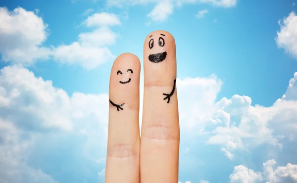 Nahaufnahme zweier Finger mit Smiley-Gesichtern — Stockfoto