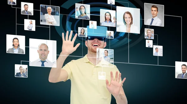 Happy man in virtual reality headset or 3d glasses — Stock Photo, Image