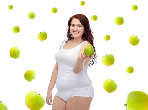 Size plus szczęśliwe kobiety w bieliźnie z jabłkiem — Zdjęcie stockowe