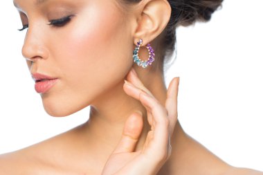 close up of beautiful woman face with earring clipart