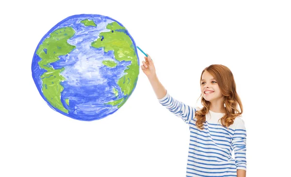 Girl drawing planet earth in the air — Stock Photo, Image