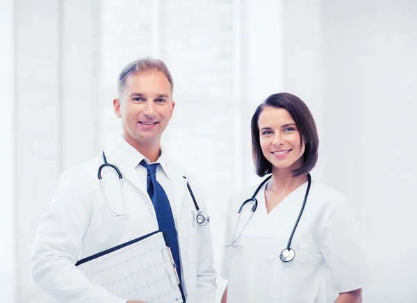 Two doctors with stethoscopes — Stock Photo, Image