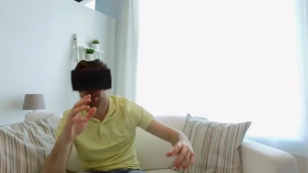 Man in virtual reality headset playing game — Stock Video