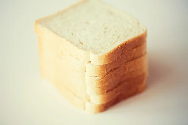 Close up of white toast bread on table — Stock fotografie