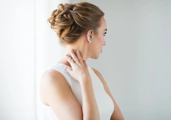 Close up of beautiful woman with ring and earring — Stock Photo, Image