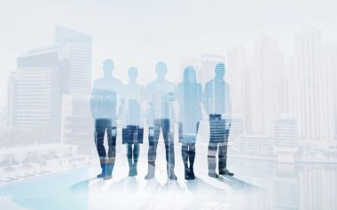 business people silhouettes over city background clipart