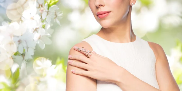 Close up of beautiful woman with ring and earring — Stock Photo, Image