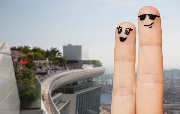 Close up of two fingers with smiley faces — Stock Photo, Image