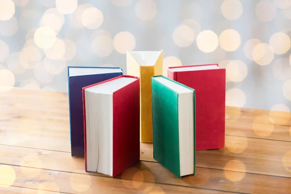 Close up of books on wooden table — Stock Photo, Image