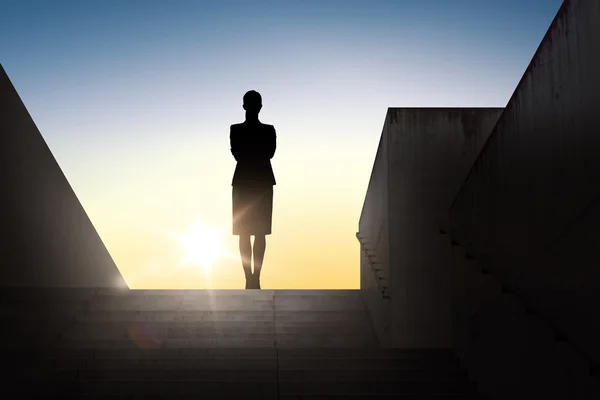 Silhouette of business woman with over sun light — Stock Photo, Image
