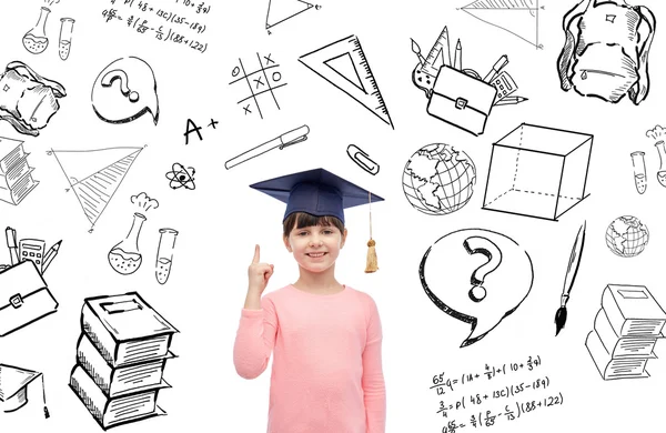 Happy girl in bachelor hat or mortarboard — Stock Photo, Image