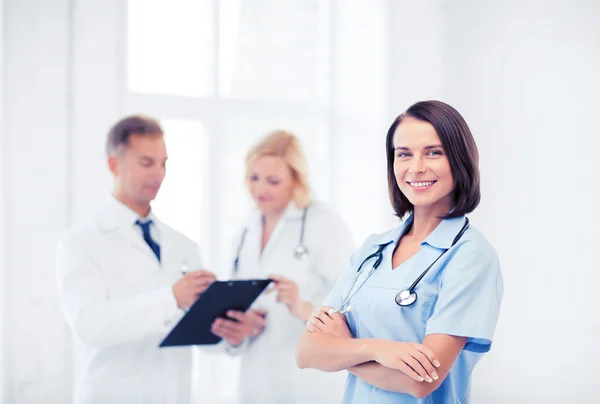 Young female doctor with stethoscope — Stock Photo, Image