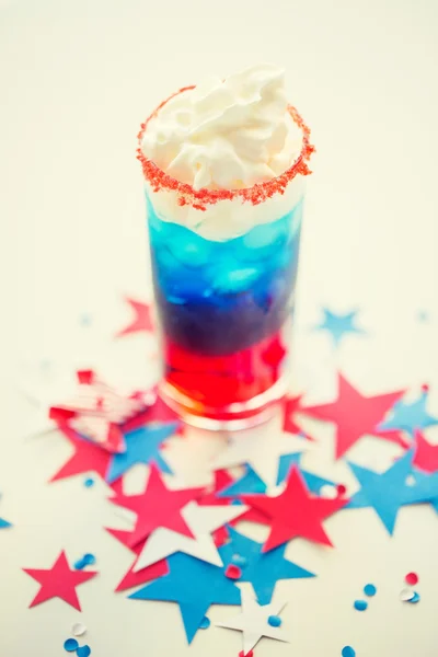 Glass of drink on american independence day party — Stock Photo, Image