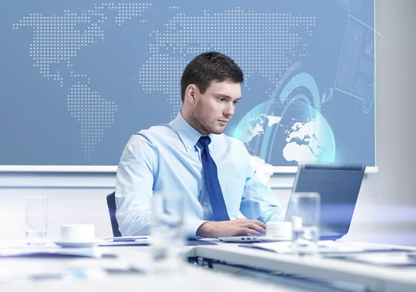 Businessman with laptop working in office — Stock Photo, Image