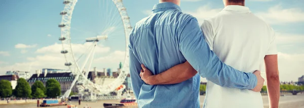 Close up of male gay couple over london — Stok fotoğraf