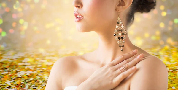 Close up of beautiful woman with earrings — Stock Photo, Image