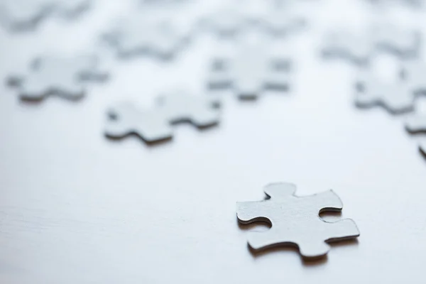 Zbliżenie na tabeli puzzlami — Zdjęcie stockowe