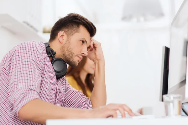 Stressed software developer at office — Stock Photo, Image