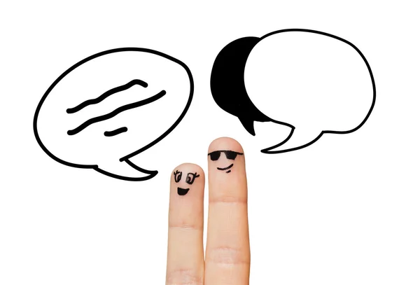 Närbild på två fingrar med kommunikation moln — Stockfoto