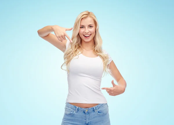 Happy young woman or teenage girl in white t-shirt — Stock Photo, Image