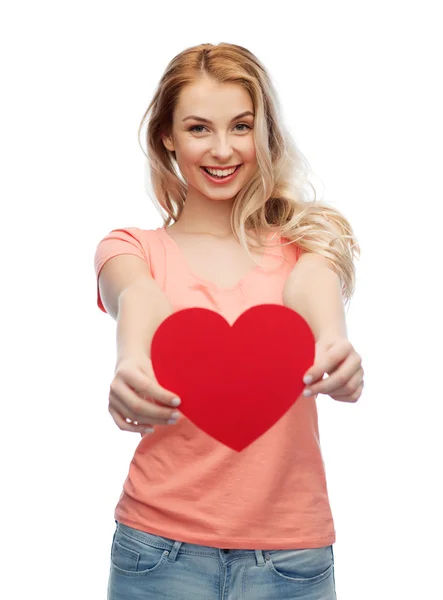 Happy woman or teen girl with red heart shape — Stock Photo, Image