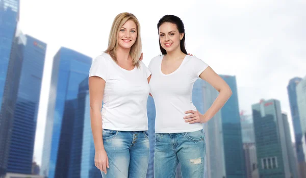 Group of happy different women in white t-shirts — Stock Photo, Image