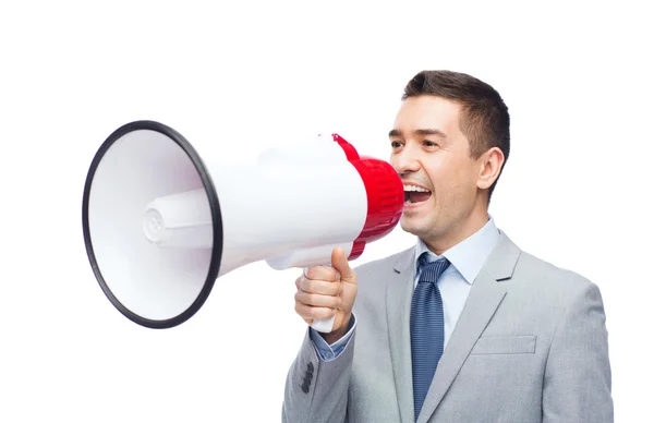 Empresário feliz em terno falando com megafone — Fotografia de Stock