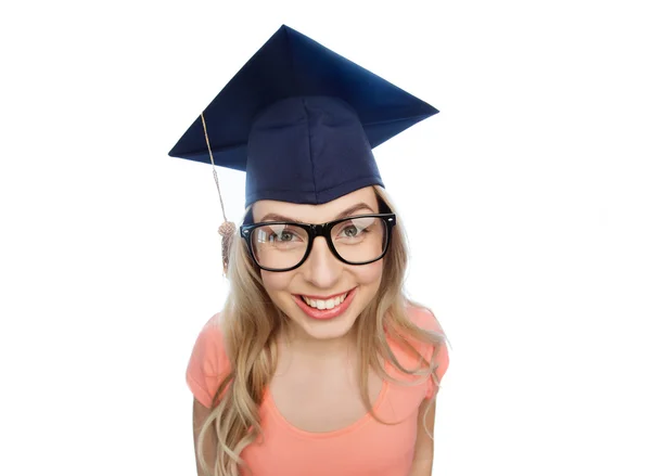 Smiling young student woman in mortarboard — Stock Photo, Image