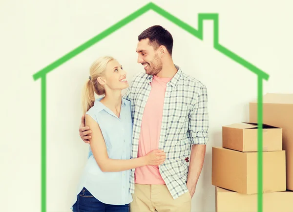 Paar mit Pappkartons zieht in neues Zuhause — Stockfoto
