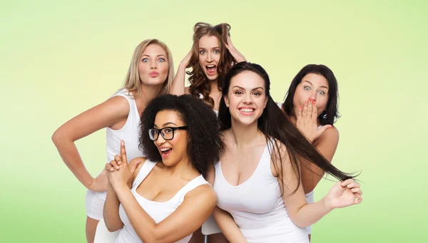 Group of happy women in white underwear having fun — Stock Photo, Image